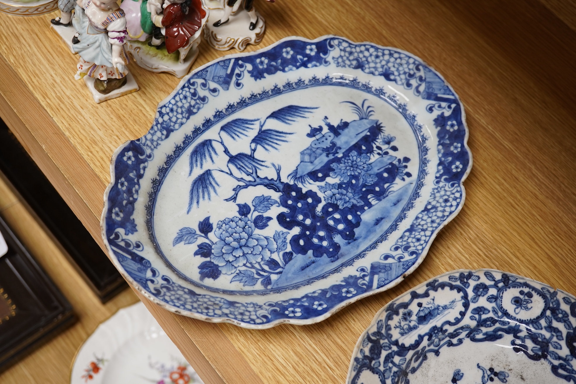 Two 18th century Chinese blue and white dishes, largest 31cm